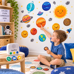 Child using TalkiPlay Planet Set for speech, language and communication learning at home.