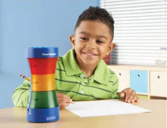 Young boy sitting at desk with the Time tracker 