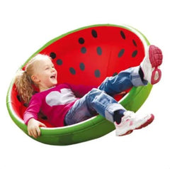 Tilted Watermelon Rocking Bowl with young child sitting inside