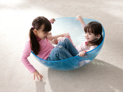 WePlay Rocking Bowl supporting active movement and balance play for two children
