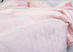 Weighted blanket in light pink colour