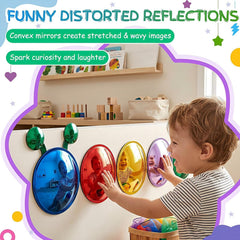 Child exploring distorted reflections in colourful bubble mirrors.