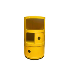 Circular Componibili 3 drawer storage unit in yellow with top drawer slid fully open and middle drawer slid half open