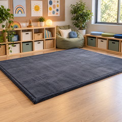 Dark grey memory foam mat in a calming space