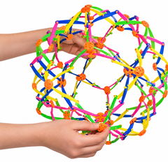 Hands holding a colorful expandable breathing ball.