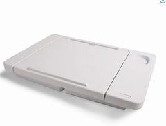 A foldable floor table neatly folded flat.