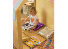 This is an image of a wooden Playhouse Play house. It has a rainbow cover over the top of the arch. It has a child reading books inside. Autism Space - Cosy Retreat
