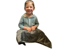 This is an image of a child using a grey quilted Weighted Lap Pad - Great for School and Home.