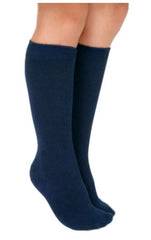 Child's legs wearing navy blue calmcare knee high sensory socks 