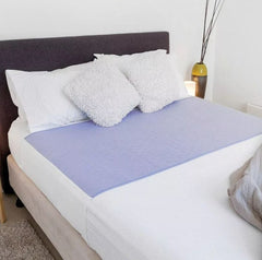 Image of a Mauve Bed Pad with Tuck-ins.