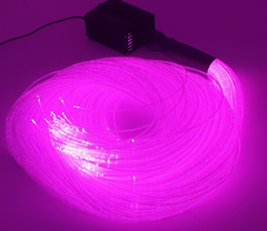 Coiled pink LED optic light with power adapter.
