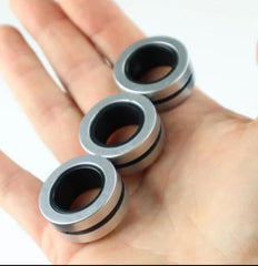 This is an image of someone holding Magnetic Fidget Rings.