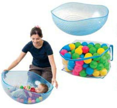 This is an image of a clear rocking bowl for children to play and rock in. It also has coloured balls.
