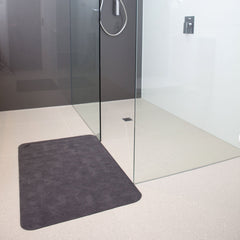 this is an image of the absorbant, non slip mat for bathrooms and doorways and kitchens and laundry - grey