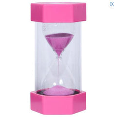 A sand timer filled with pink sand
