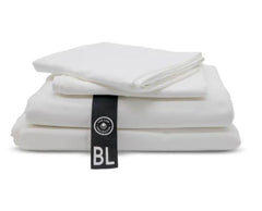 This is an image of a white set of The Lad Collective 2.0 fitted sheet set. 