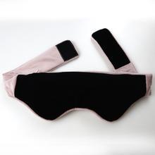 This is an image of the back of a Pink Calming Weighted Eye Mask. It has velcro tabs at the end of each strap.