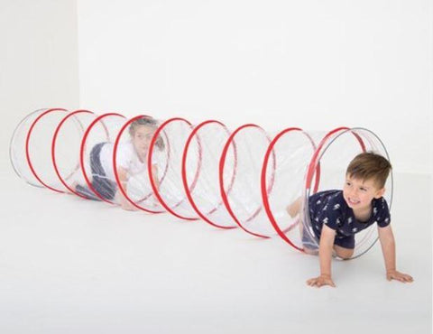 This is an image of children climbing through a Transparent Crawling Tunnel
